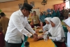 Tuntaskan Uji Coba Makan Gratis di Enam Kabupaten, Pj.Bahtiar: Pastikan Dapat Manfaat Gizi dan Ekonominya